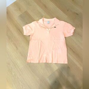 Lacoste peach polo shirt